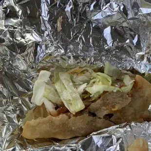 This literally was the taco that I received! the first one was ok but this one looked like they said F it!