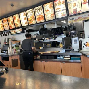 a man standing at the counter