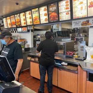 a man and a woman ordering food