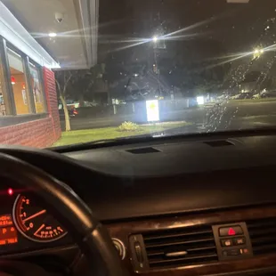 the dashboard of a car at night