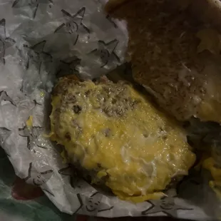 a cheeseburger in a wrapper