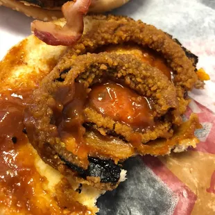 The onion is BLACK....the edges of the bun...BLACK ... gross.