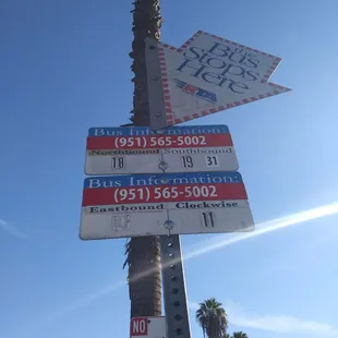 a street sign and a no parking sign