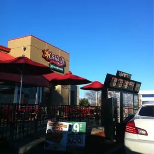 a car parked in front of a restaurant