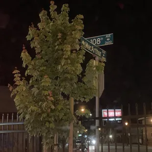 a street sign at night