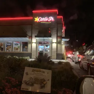 the outside of a restaurant at night