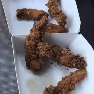 Burnt and old ,but the drive thru girl decided to give me old tenders to give me my order because rushed to give me my order