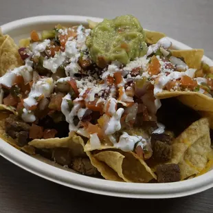 nachos with guacamole and sour cream