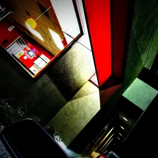 a red door and a green wall