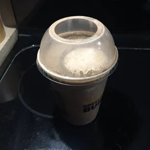 a cup of coffee on the stove