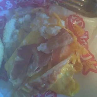 This is supposed to be a bacon, egg &amp; cheese biscuit but the bacon was raw on both biscuits! Nice quality service-NOT!!!!