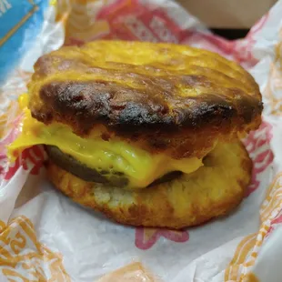 Burnt sausage, egg and cheese biscuit