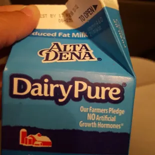 Opened milk carton given to child...tisk tisk tisk