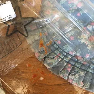 Red sauce from the chicken on my grilled chicken salad.  They took the chicken off a sandwich that was already made?