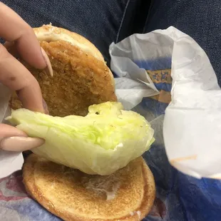 a person eating a sandwich