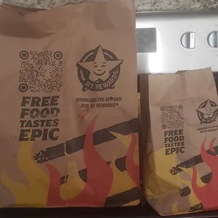 Big bag holding my hot items and a small bag holding my dessert.