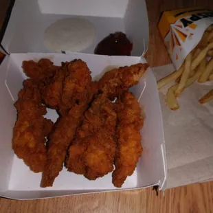 Chicken tenders and fries.