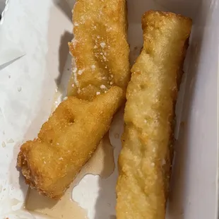 two deep fried fish sticks