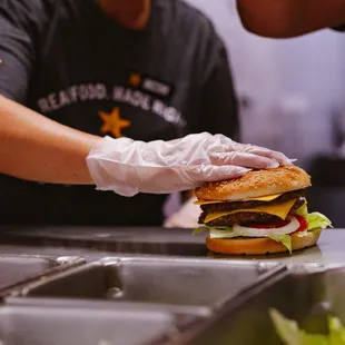 a hamburger being prepared