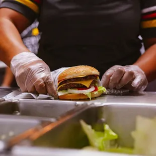 a hamburger being prepared