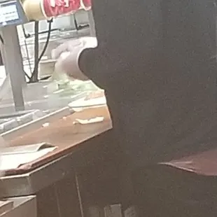 a man preparing food in a restaurant