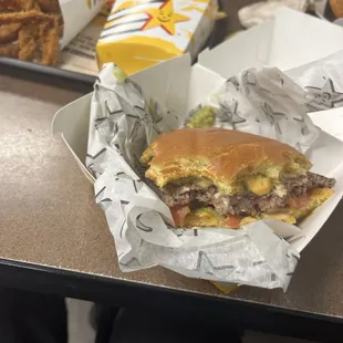 a cheeseburger and fries