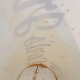 I found a clear thumb tack at the bottom of my cup.