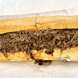 Buffalo "Cheese" (or lack thereof) "steak" sub, large. Missing cheese and buffalo flavor. Requested to be cut in 1/3.
