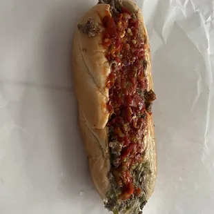 Steak and cheese with peppers onions and hots