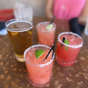 a close up of three drinks