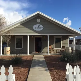 Cute little house and white picket fence