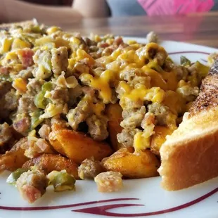 Slop is a mainstay here... Tons of sausage, peppers, onions, potatoes and cheese.