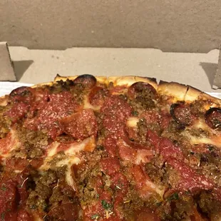 Large pepperoni and sausage pizza with extra sauce.  Best thin crust in Center Ohio!