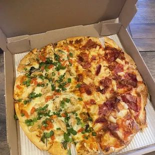 Left half: Deluxe White Pizza Right half: Hawaiian Pizza