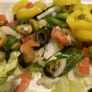 Generous and fresh toppings on my custom ordered salad.  Yum!