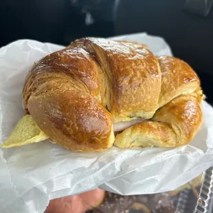 #1 which is a Bacon, Ham, Egg Cheese, Jalapeño Croissant