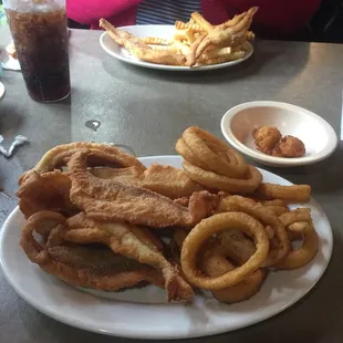 a plate of fried fish and onion rings