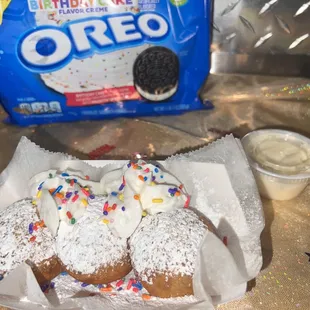 Birthday Oreos. Get them Birthday Style (whipped cream icing and sprinkles)