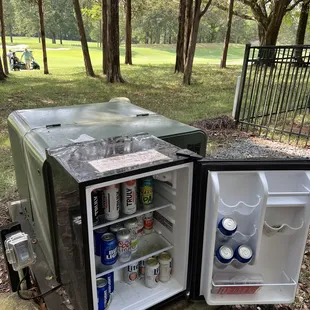 the &apos;14th hole, home stretch&apos; A homeowner provided fridge with cold beverages, mostly Bud Light&apos; you&apos;re on the honor system