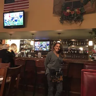 Marie, our server!! Cool back bar and made to order food!!