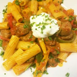 Rigatoni Ambrosia tonight's special with Italian sausage, green and red bell pepper spicy marinara topped with ricotta YUM!