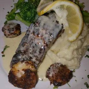Tonights special. The best blackened salmon with lemon cream sauce I've ever had!