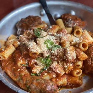 Bronx Tale (Mimmo&apos;s meatballs and Sulmona sausage, slow cooked tomato sauce, tossed with rigatoni.) My husband loved this.
