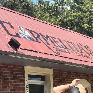 a woman in a black hat