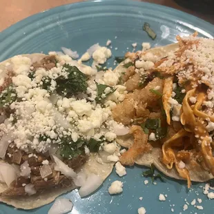 2 Street Tacos Carnitas on the left, shrimp on the right