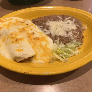 Delicious chicken enchiladas suizas. Cream sauce. Refried beans flavorful and hot in temperature. This is important!