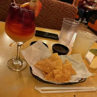 Champagne Sangria chips salsa and refried black beans Cadillac Margarita shot of house tequilla