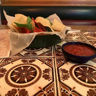 Warm fresh chips. Homemade salsa.