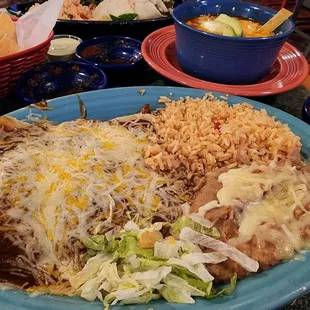 Shredded beef enchiladas, rice &amp; refried beans