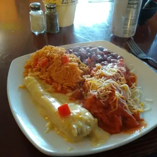 Chicken tamale, beef enchilada, beans and rice perfect